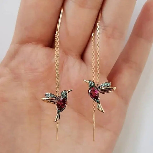 Øreringe med guldkolibri og krystaller