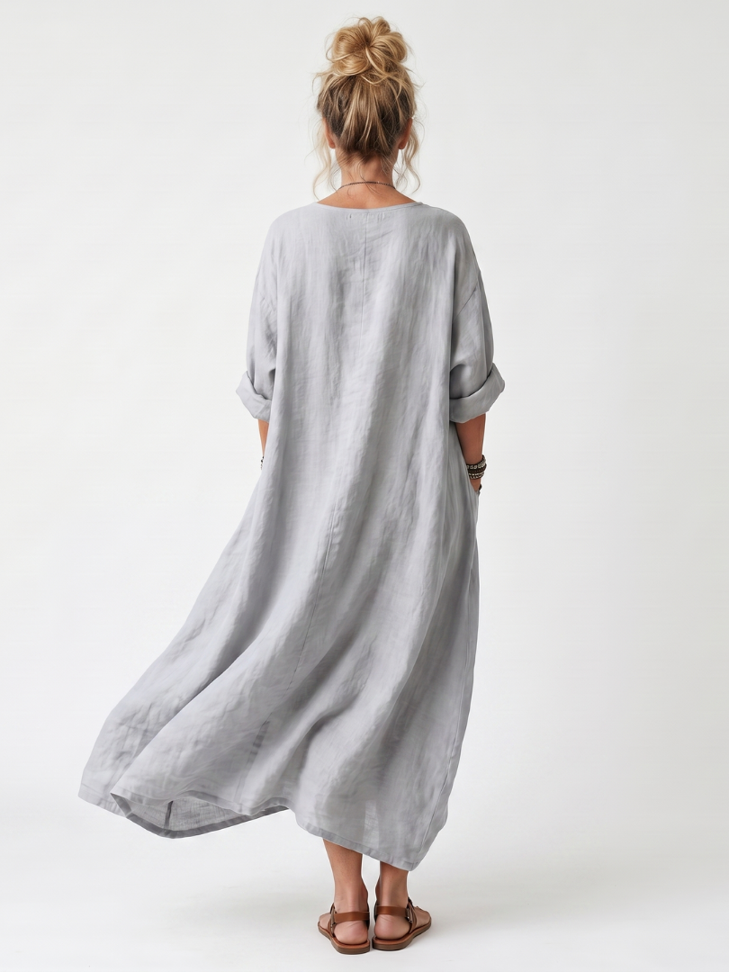 Raina | Oversize midikjole med broderet kontrastindsats og lommer