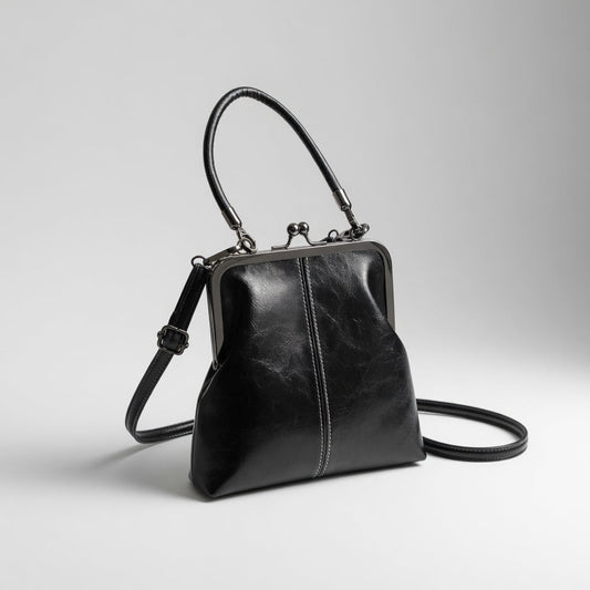 Honorine™ — Retro håndtaske med clipslukning og parisisk elegance