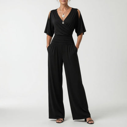 Gaëlle™ — Løstsiddende, flydende jumpsuit med V-hals og afslappet, tidløs elegance