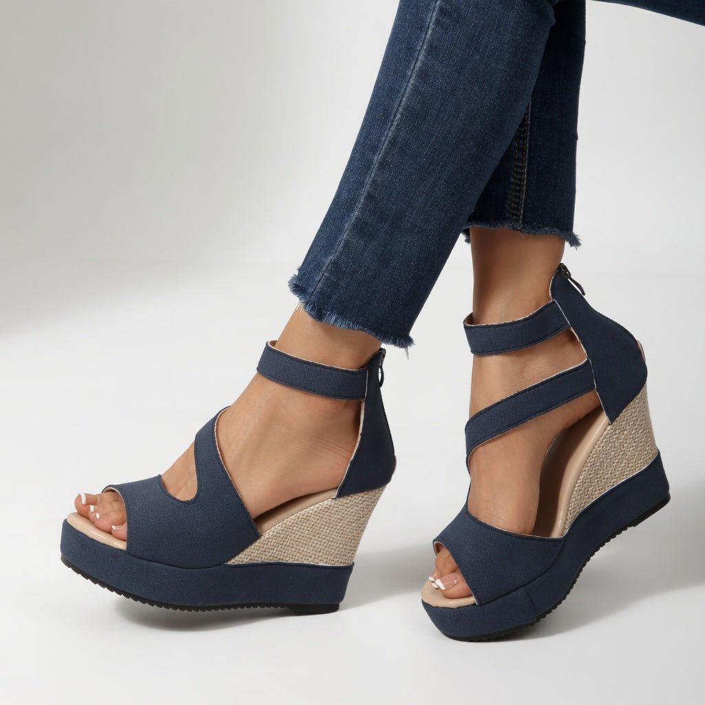Jocelyne™ — Kilesandal med elastisk rem i rent, naturligt look