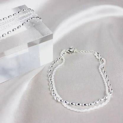 Elegant armbåndssæt i sølv med zirkonsten