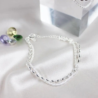 Elegant armbåndssæt i sølv med zirkonsten