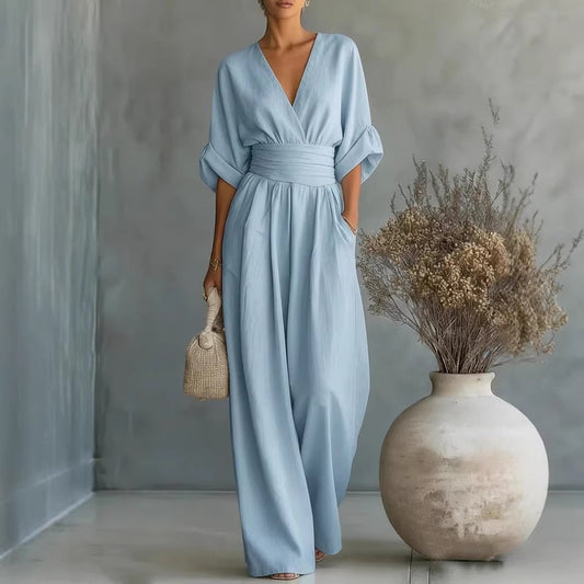 Elegant kjole med V-udskæring, åben ryg og flydende ærmer - Maison Claire et Sylvie