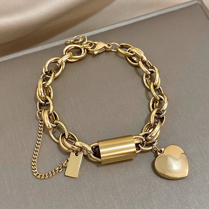 Chunky armbånd med guldhjerte