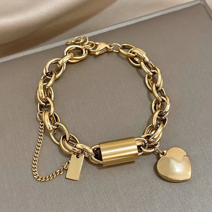 Chunky armbånd med guldhjerte