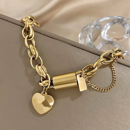 Chunky armbånd med guldhjerte
