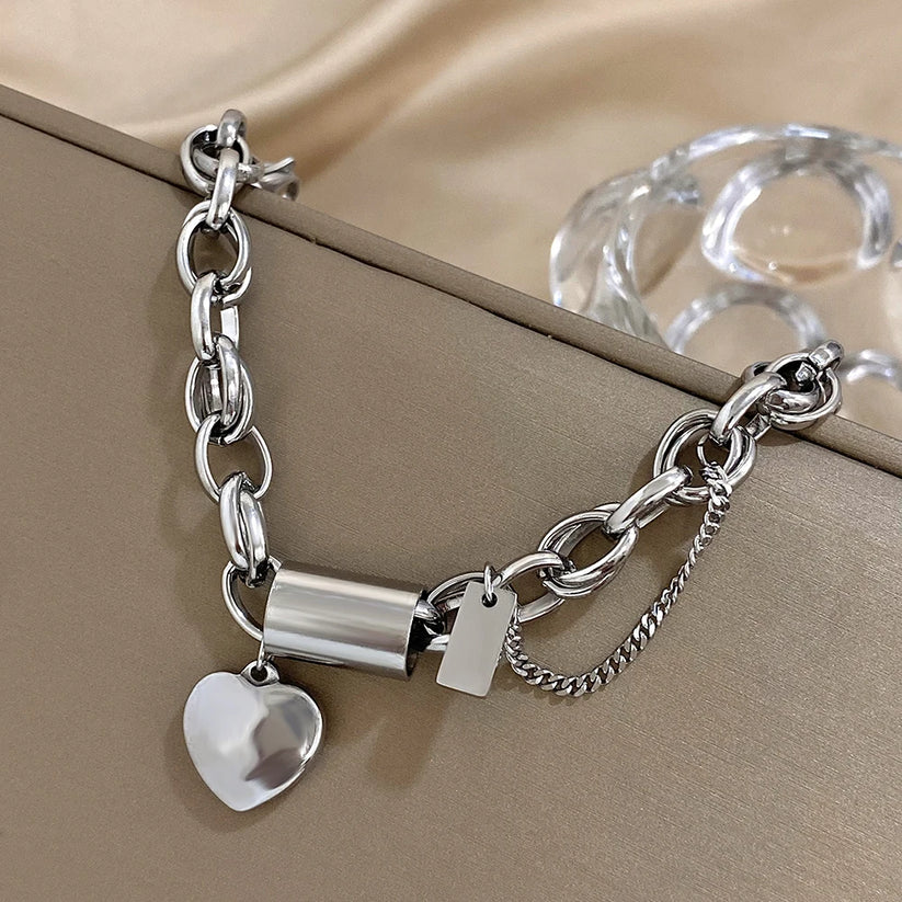 Chunky armbånd med guldhjerte