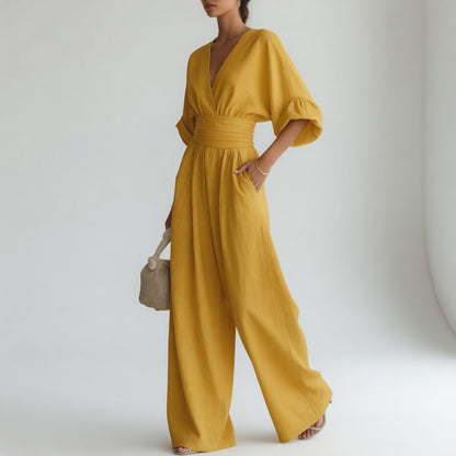 Blandine™ – Vid jumpsuit med V-hals og naturlig flydende elegance
